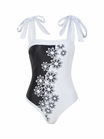 Едночастен бански с флорален принт; полиестерна материя; подплата от полиестер и спандекс; без ръкави