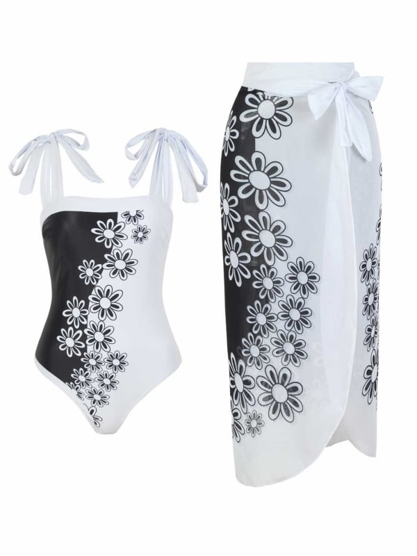 Едночастен бански с флорален принт; полиестерна материя; подплата от полиестер и спандекс; без ръкави