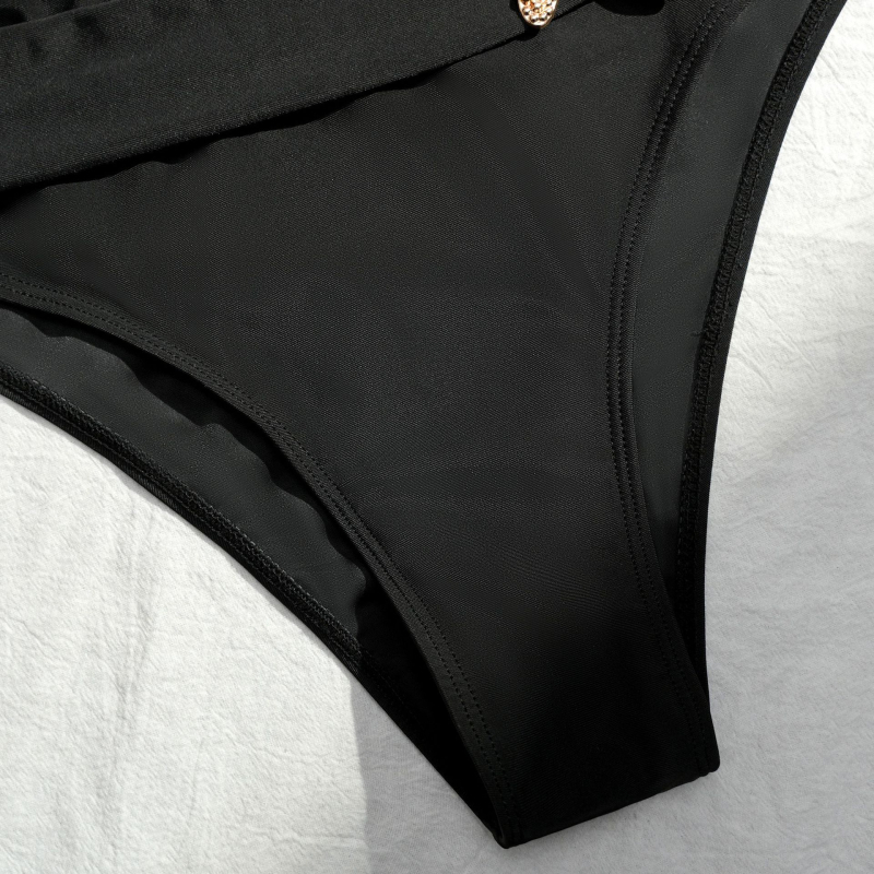 Kaksos osaline ujumistrikoo rihmade detailidega, nailon 80%, vooder polüester 20% elastaani, rinna pad, ilma teraseta toestus