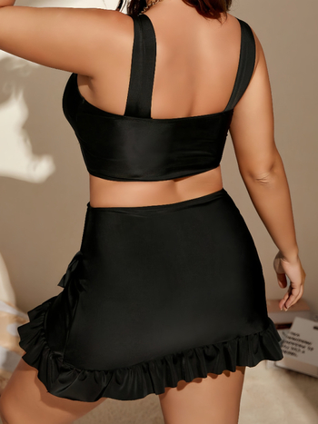 Naistele kahest osast peldkostüüm, kõrge vöö, volangid, rinna padjad, nailon