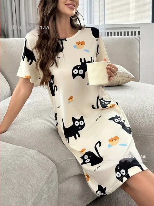 Едночастова луксозна пижамена рокля с кръгло деколте и миди дължина, 100% полиестер.