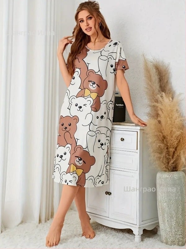 Едночастова луксозна пижамена рокля с кръгло деколте и миди дължина, 100% полиестер.