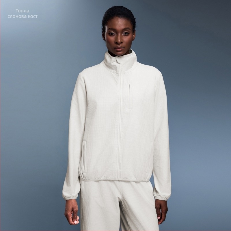 Женско външно спортно яке: водоустойчиво и ветроустойчиво, със стойка яка, с дълги ръкави, без подплата