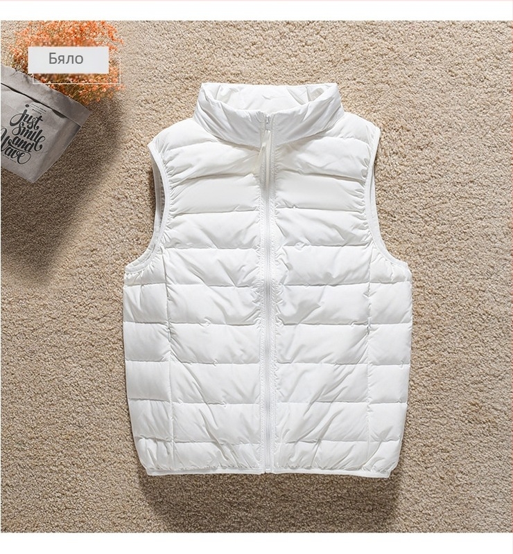 Дамска тънка пухена жилетка с стояща яка и цип, пълнеж пух от патици, Slim кройка, дължина 50–65 см.