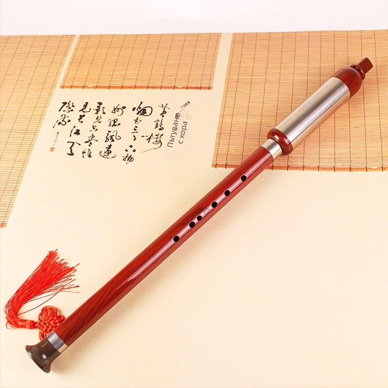 Bawu: резинова имитация на махагоново дърво, вертикален духов инструмент; ключове: C, Bb, G, F; кожена кутия