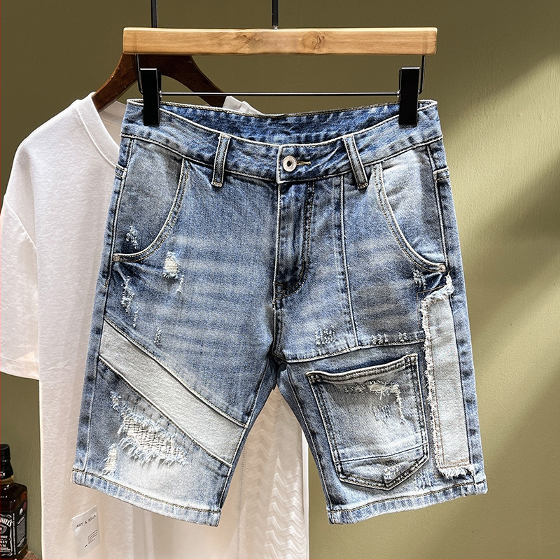 Siuvinėtos džinsinės kelnės su skylutėmis. Vyriškos užsienio prekybos tarpvalstybinio lokomotyvo madingos firminės elastinės, plonos, siuvinėtos kelnės.