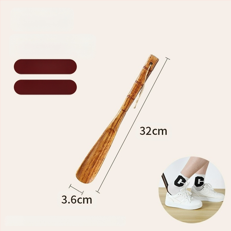 Täispuidust kingatõmmits majapidamises, pika käepidemega, eakad rasedad naised, mitte painutatud kingatõmmits, kulunud kinga artefakt, puidust kingatõmmits, säästab aega