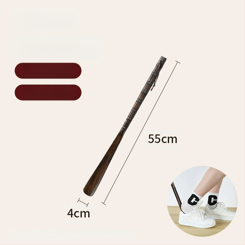 Täispuidust kingatõmmits majapidamises, pika käepidemega, eakad rasedad naised, mitte painutatud kingatõmmits, kulunud kinga artefakt, puidust kingatõmmits, säästab aega