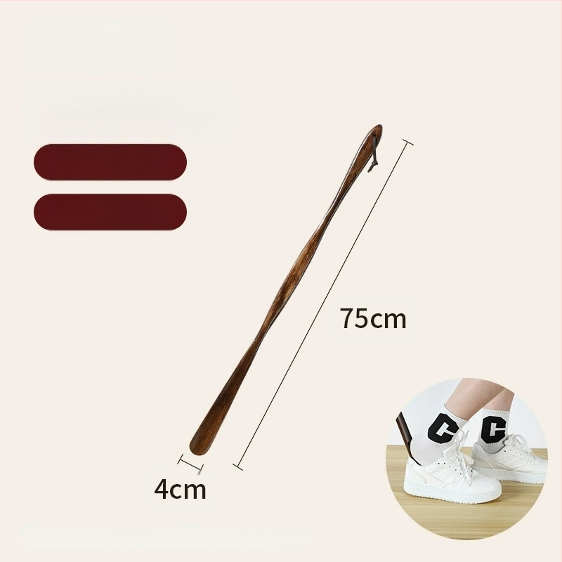 Täispuidust kingatõmmits majapidamises, pika käepidemega, eakad rasedad naised, mitte painutatud kingatõmmits, kulunud kinga artefakt, puidust kingatõmmits, säästab aega