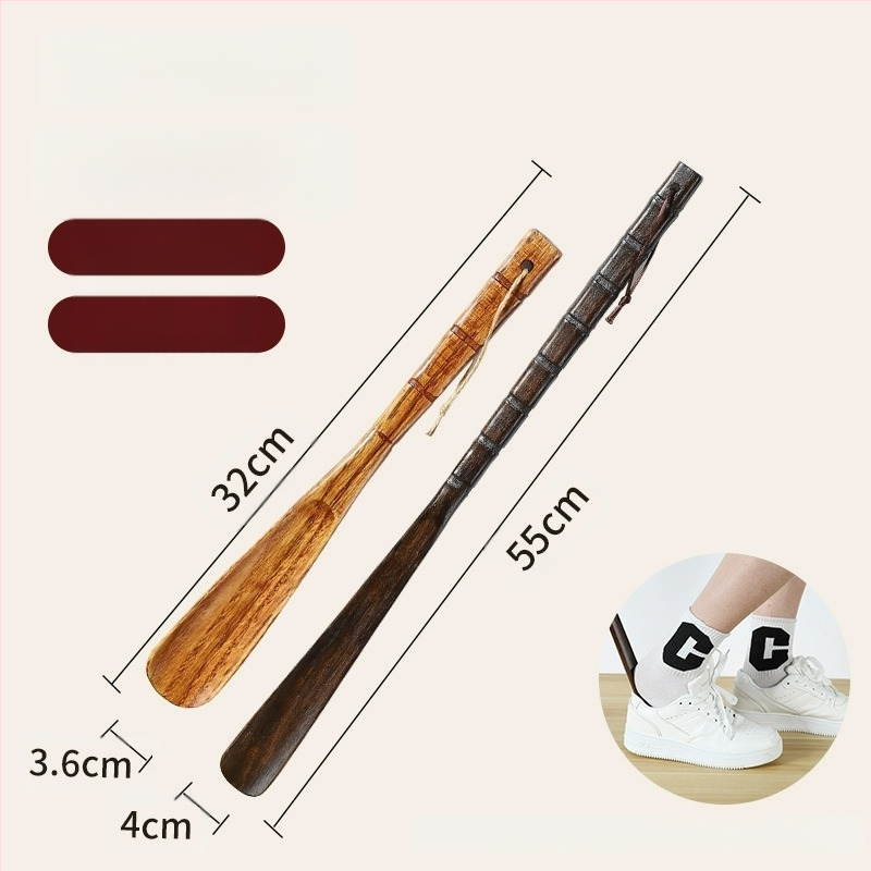 Täispuidust kingatõmmits majapidamises, pika käepidemega, eakad rasedad naised, mitte painutatud kingatõmmits, kulunud kinga artefakt, puidust kingatõmmits, säästab aega