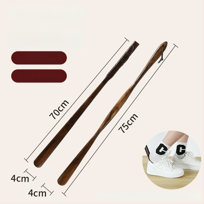 Medžio masyvo batų traukiklis, ilga rankena, pagyvenusių moterų, nėščių moterų, nesulenktų batų, dėvėtų batų artefaktą, medinį batų traukiklį, taupantį laiką