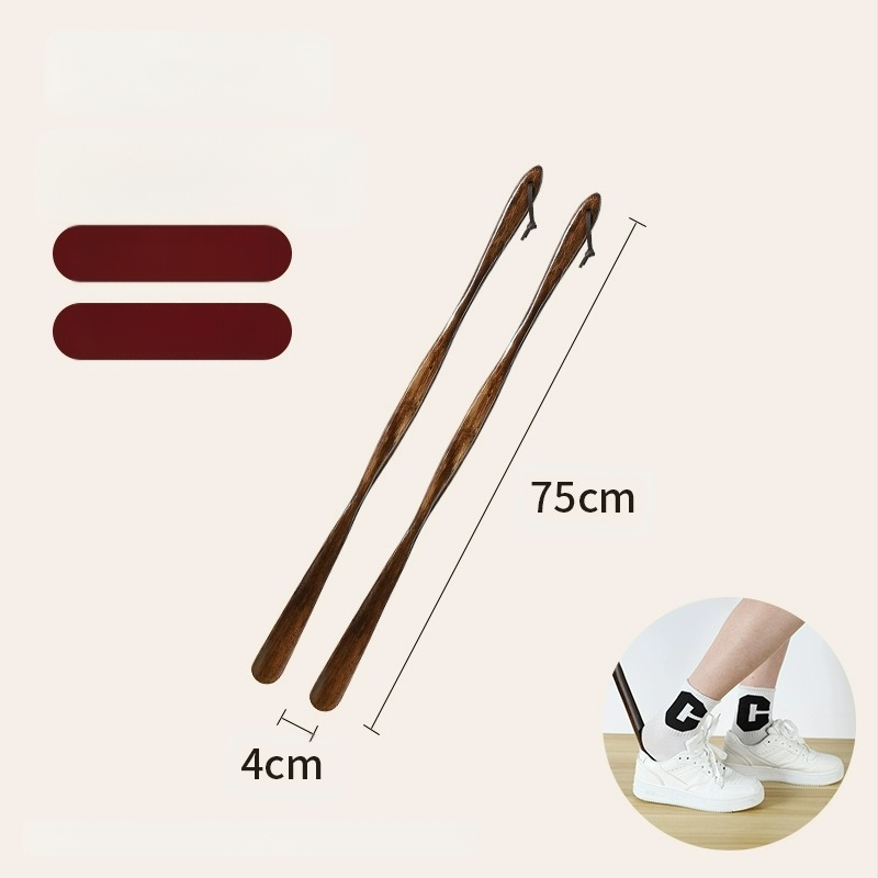 Täispuidust kingatõmmits majapidamises, pika käepidemega, eakad rasedad naised, mitte painutatud kingatõmmits, kulunud kinga artefakt, puidust kingatõmmits, säästab aega