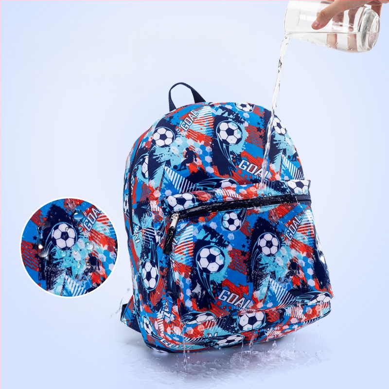 Piiriülene laste koolikottide kolmeosaline komplekt kerge multifunktsionaalne koolikottide koomiksiga trükitud seljakott algkooliõpilastele