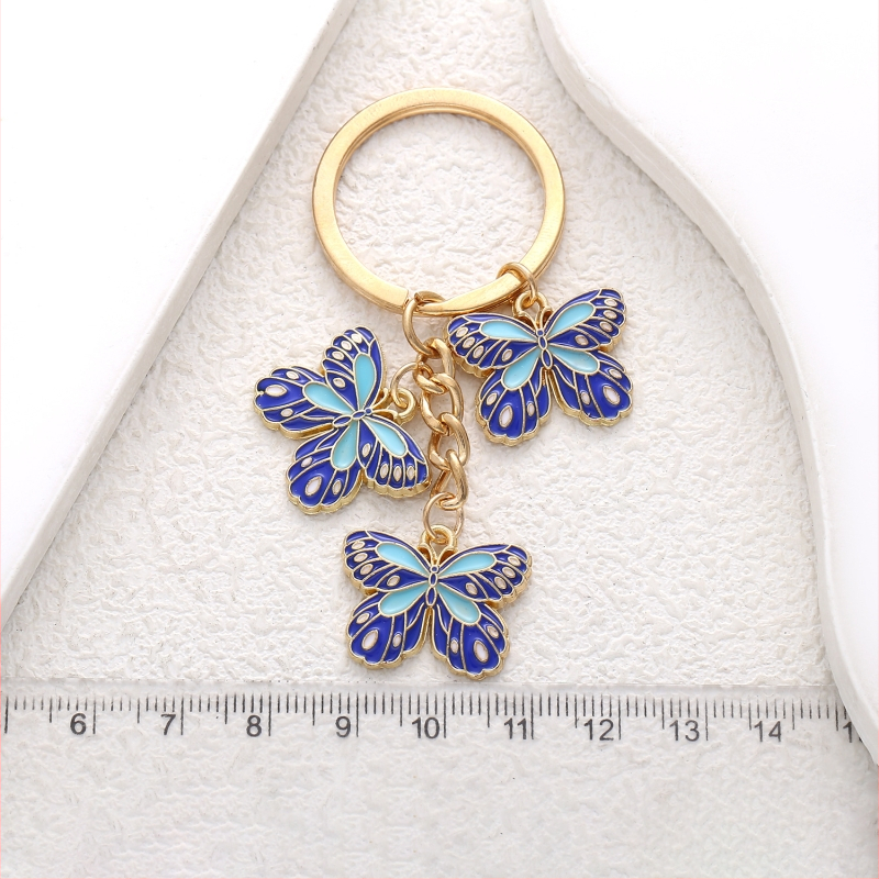 Salda stila eļļas piloša zila tauriņa kulona atslēgu piekariņa aksesuāri rotaslietas maza soma plecu soma kulons labākais draugs daudzpusīgs