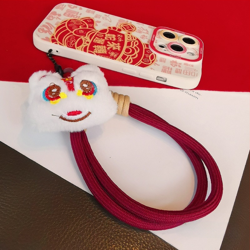 2025 m. prabangios nuotaikos Naujųjų metų raudonas mobiliojo telefono virvelis, mielas pliušinis liūto lėlės pakabukas ant riešo, trumpas