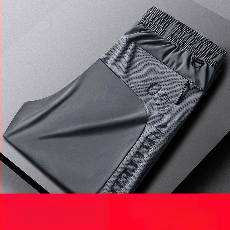 Tvornica izravno M-8X ljetne tanke elastične hlače velike veličine od ledene svile, ljetne muške sportske ležerne hlače s patentnim zatvaračem i džepovima