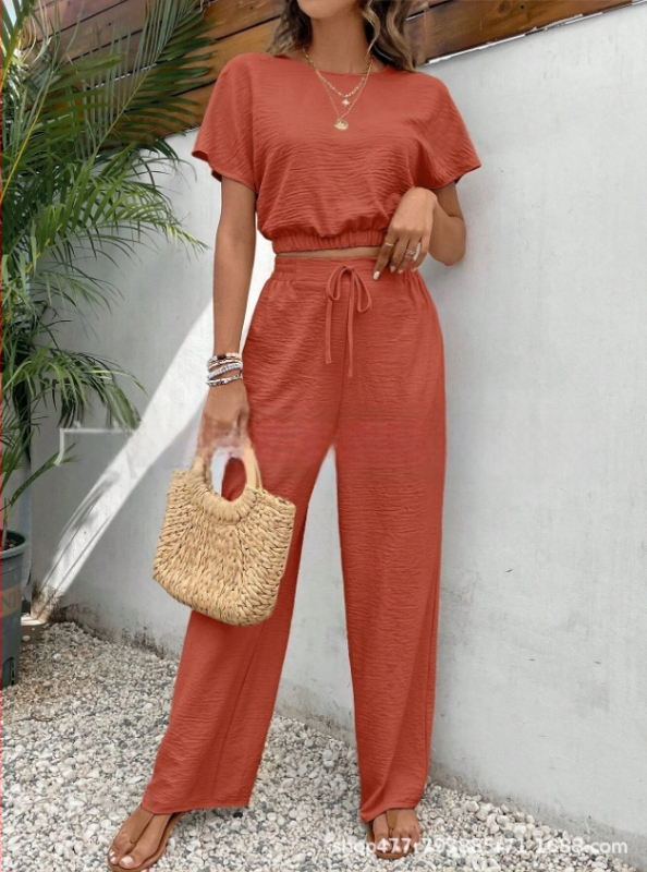 Novo popularno žensko jednobojno odijelo s okruglim izrezom i uskim gornjim dijelom bez rukava za ljeto 2024.