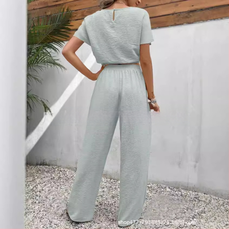 Novo popularno žensko jednobojno odijelo s okruglim izrezom i uskim gornjim dijelom bez rukava za ljeto 2024.