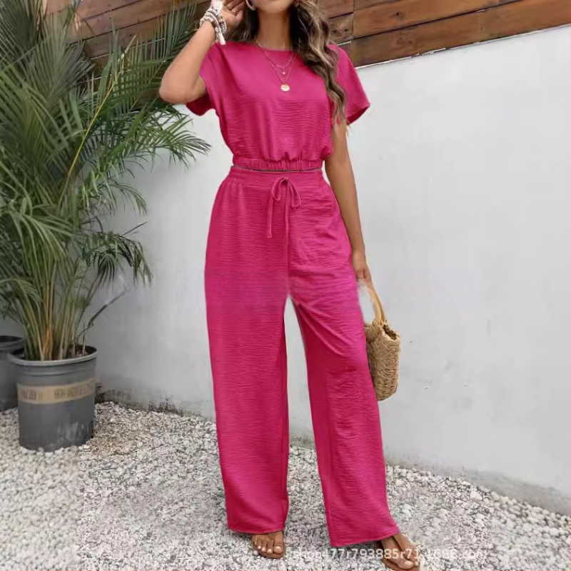 Novo popularno žensko jednobojno odijelo s okruglim izrezom i uskim gornjim dijelom bez rukava za ljeto 2024.