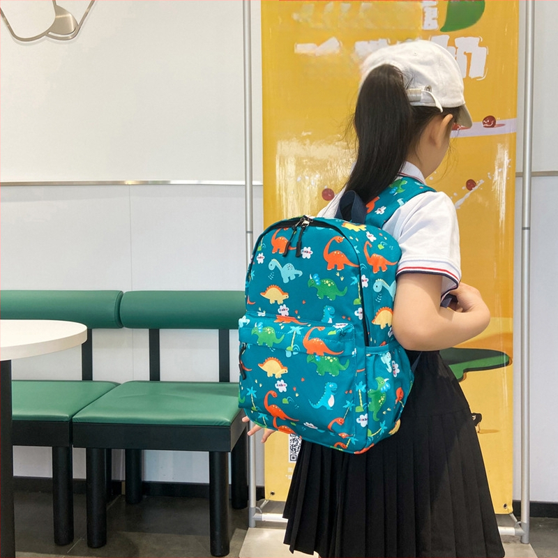 Pārrobežu ārējās tirdzniecības dzīvnieku dinozauru skolas soma zēniem un meitenēm bērnudārza mugursoma ceļojumu uzkodu mugursoma bērniem viegls