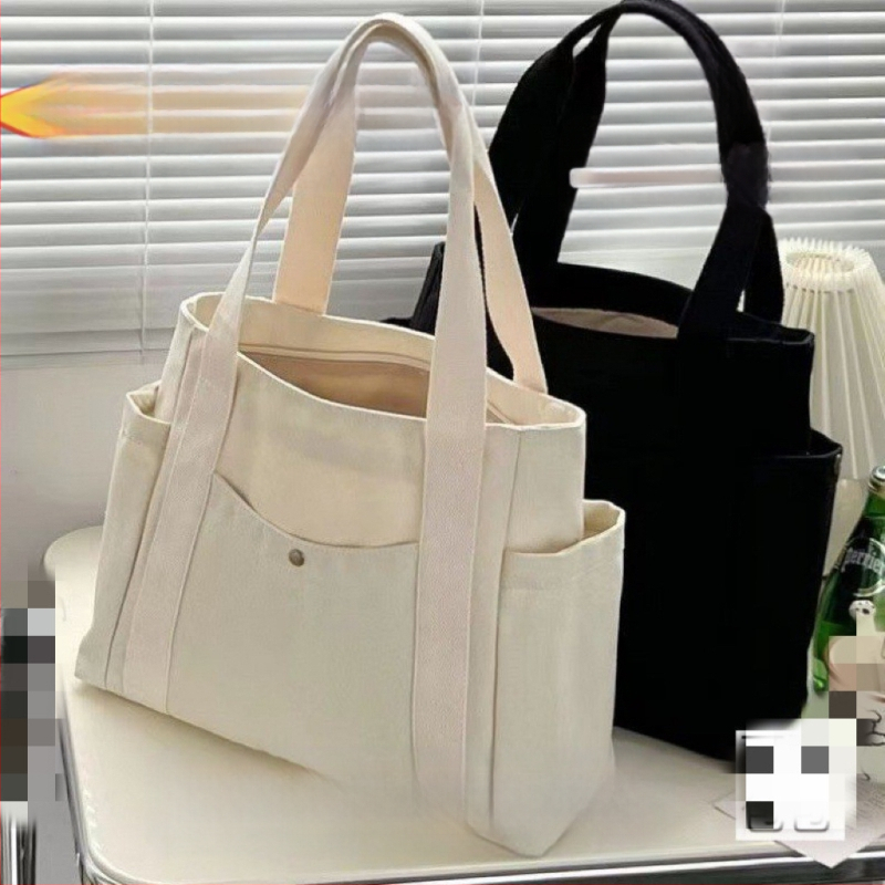 2024. aasta uus lõuendikott, naiste universaalne õlakott, suure mahutavusega raamatutega täidetud õpilase klassiruumi pendeldajakott, uus käekott