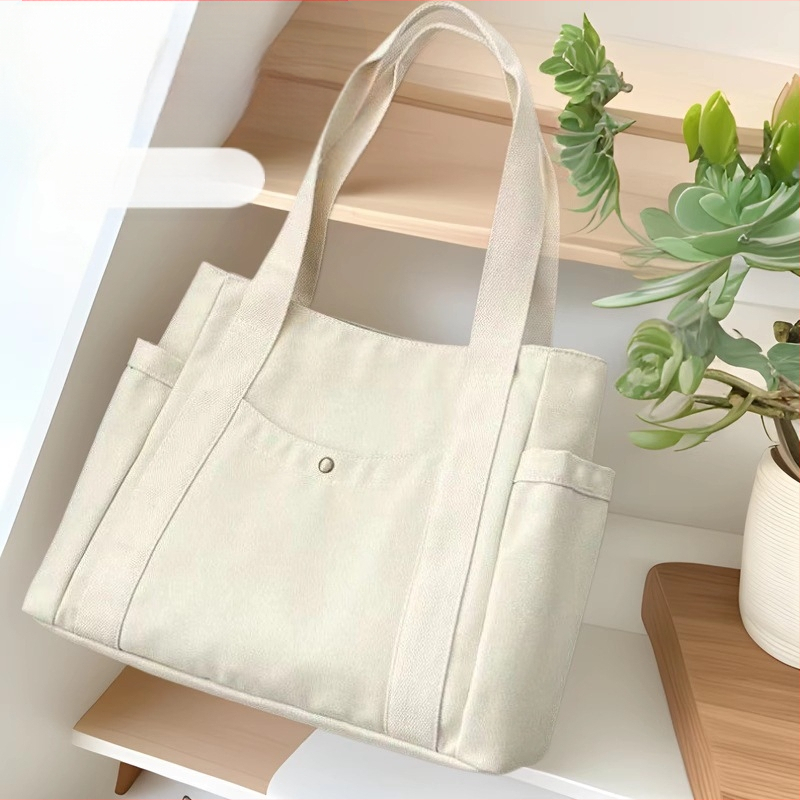 2024. aasta uus lõuendikott, naiste universaalne õlakott, suure mahutavusega raamatutega täidetud õpilase klassiruumi pendeldajakott, uus käekott