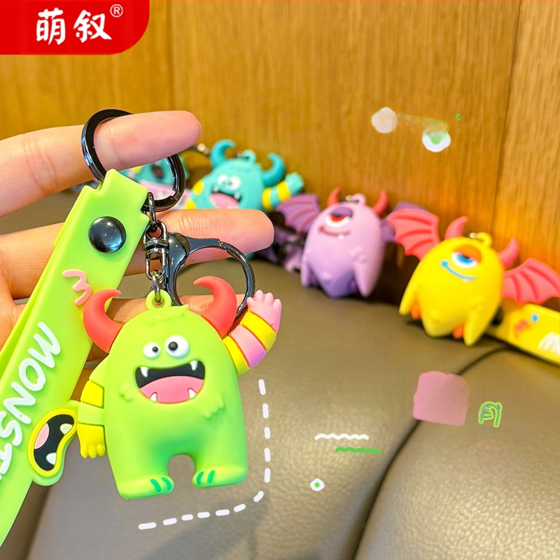 Radošs briesmoņa multfilmas atslēgu piekariņš sievietēm, jauks trīsdimensiju lelles kulons, moderns skolas somas piekarināms atslēgas mazs kulons