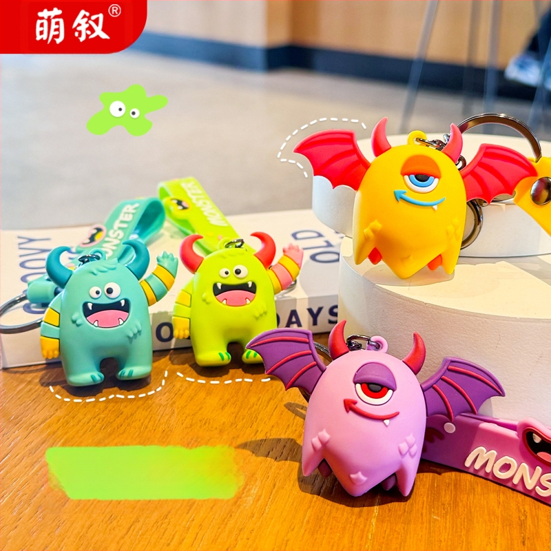 Radošs briesmoņa multfilmas atslēgu piekariņš sievietēm, jauks trīsdimensiju lelles kulons, moderns skolas somas piekarināms atslēgas mazs kulons