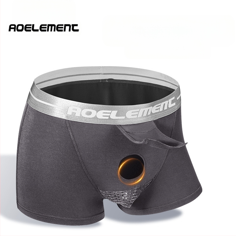 Spermatinio virželio atskyrimas kulka, kapšelio atrama, vyriški apatiniai, vyriški veniniai apatiniai šortai, krepšys, išlenkta boksininko galva.