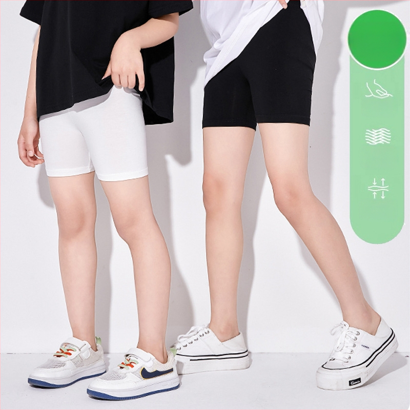 Tüdrukute turvapüksid kevadel ja suvel uued jooksmisvastased kerged suvised õhukesed beebi- ja lastekindlustusega tüdrukute lühikesed püksid jalgevahele