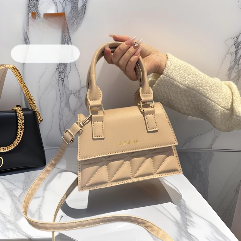 Užsienio prekybos vieno peties maža kvadratinė moteriška rankinė 2025 m. pavasario ir vasaros nauja madinga rankinė-pasiuntinio formos, skirta daugeliui didmeninės prekybos pirkimų
