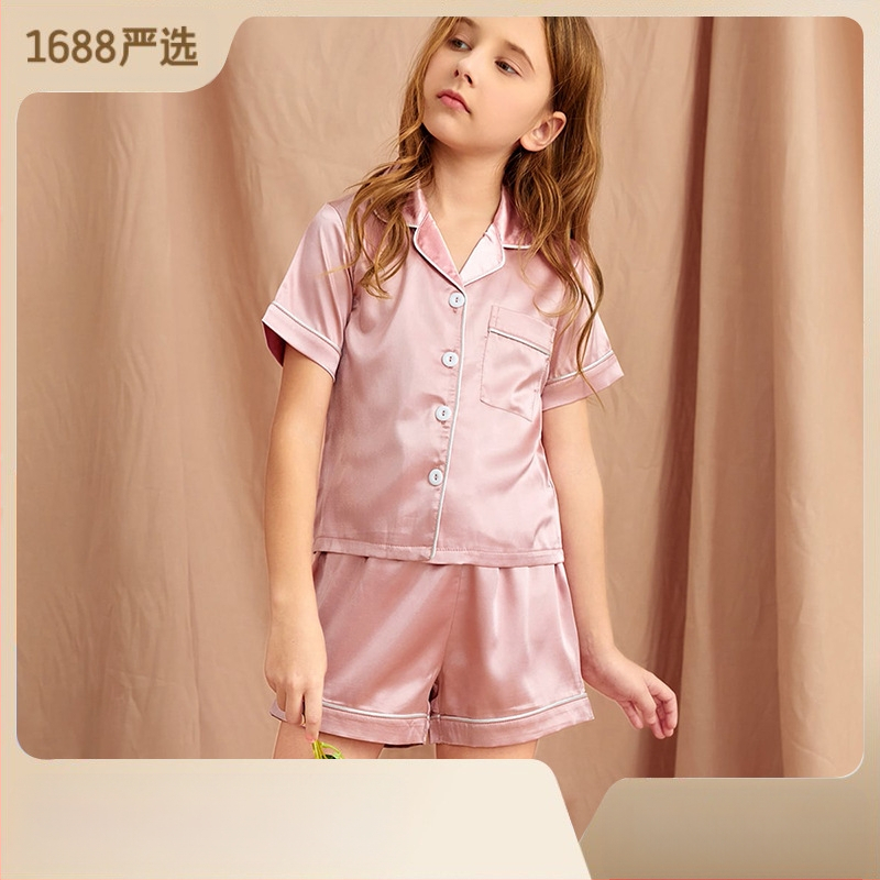 Užsienio prekyba, tarpvalstybinė, vaikiška, vasarinė, trumpomis rankovėmis, vienspalvis kostiumas, imitacinis šilkas, namų drabužiai vidutiniams ir dideliems berniukams bei mergaitėms.