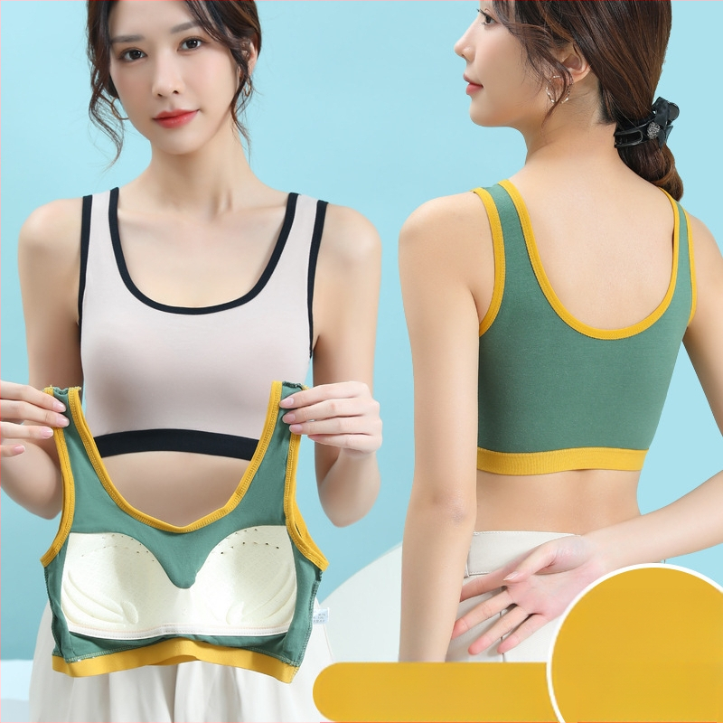 Vienos dalies fiksuoto kaušelio formos liemenėlė be plieninio žiedo, graži nugaros apačia, sportiniai apatiniai su plačia petnešėle, apvynioti krūtinės vamzdeliu, viršutiniai apatiniai