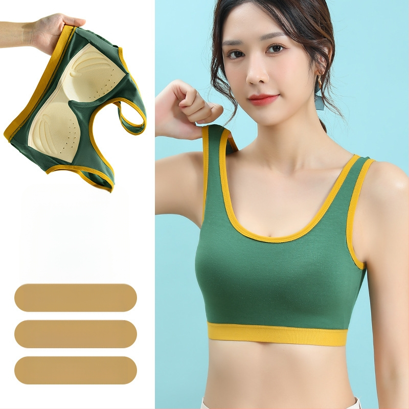 Vienos dalies fiksuoto kaušelio formos liemenėlė be plieninio žiedo, graži nugaros apačia, sportiniai apatiniai su plačia petnešėle, apvynioti krūtinės vamzdeliu, viršutiniai apatiniai