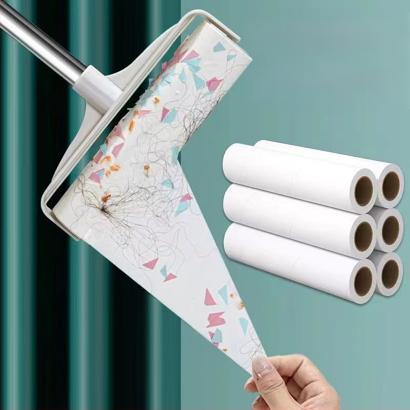 Plaukų lipdukų volelis, ilgas strypas, didelis plaukų lipdukas, lova, grindys, plaukų valymas, artefaktas, dulkių volelis, prilipęs plaukų volelis, šepetys