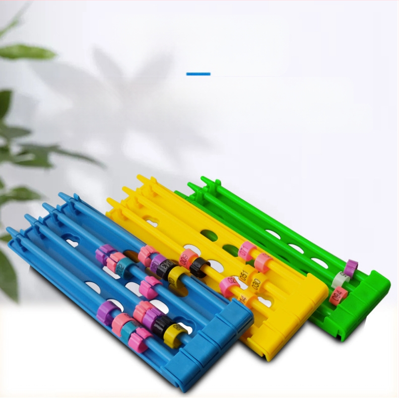 Jalarõngaste riiul tuvide võidusõidutuvide tarvikud riputatavad tuvide jalarõngaste riiul mitmevärviline klassifikatsioon jalarõngaste paigutusriiul