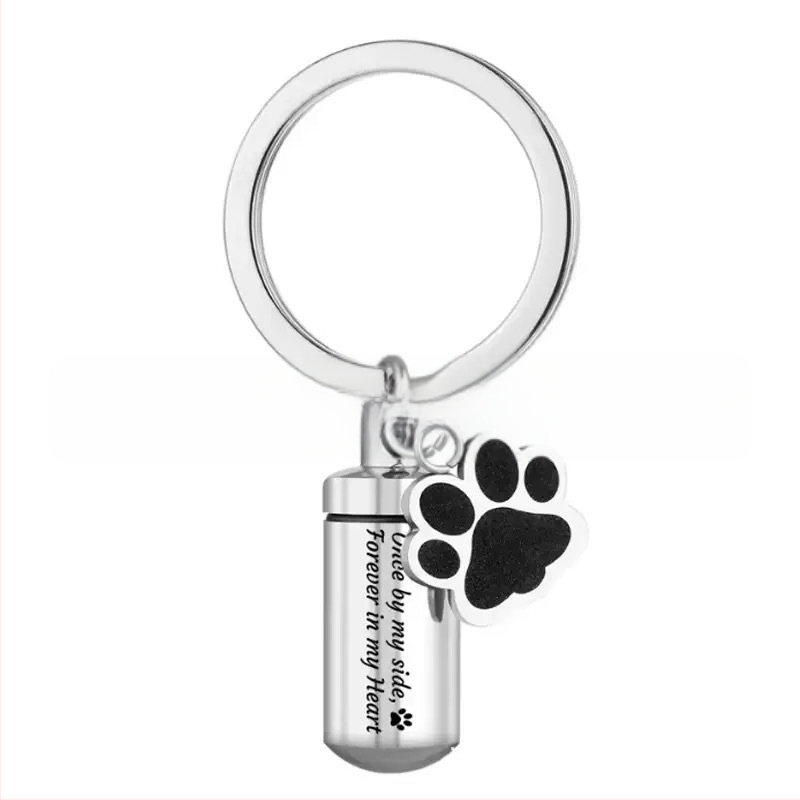 Nerūdijančio plieno naminių gyvūnėlių pelenų raktų pakabukas cilindrinis šuns letenos butelis