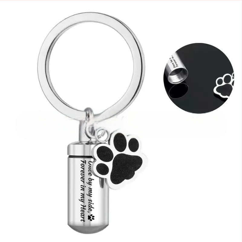 Nerūdijančio plieno naminių gyvūnėlių pelenų raktų pakabukas cilindrinis šuns letenos butelis