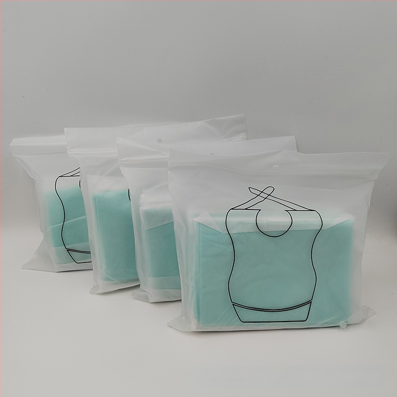 Ühekordselt kasutatav täiskasvanutele mõeldud rinnahoidja eakatele mõeldud toidutasku hooldus mittekootud põll rihmadega, veekindel ja saastumisvastane, laos olemas