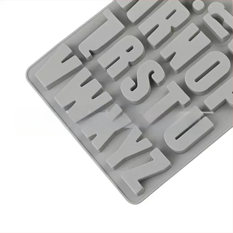 Täppsilikoonist 26 stereo inglise tähestiku koogivormi tilkliimiga isetegemise küpsetamisvahend