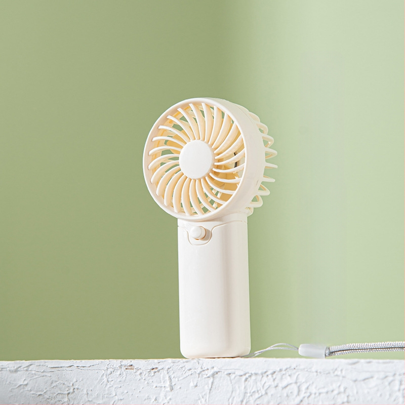 Tarpvalstybiniai sprogimai Nešiojamas mažas ventiliatorius Sausa baterija Didelis vėjas Studentams Lauko Nešiojamas mažas elektrinis ventiliatorius Dovana