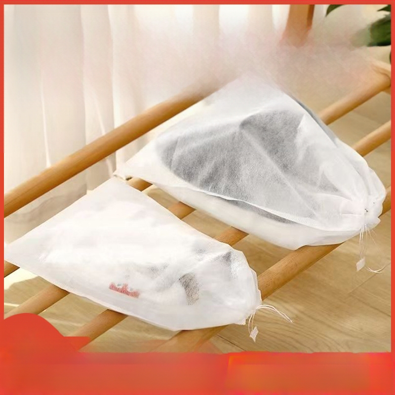 Kingakott lausriidest hoiukott pingutusnööriga kingakott väikesed valged kingad kollasusevastane tolmukate kuivatamise ja kuivatamise kingakottide tootja laos