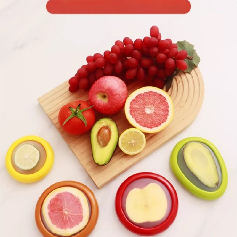 Köögis läbipaistva kile säilituskarbi külmkapi puu- ja köögiviljade pooleks lõigatud sügavkülmiku hoiukarp köögiviljade hoiukasti hulgimüük