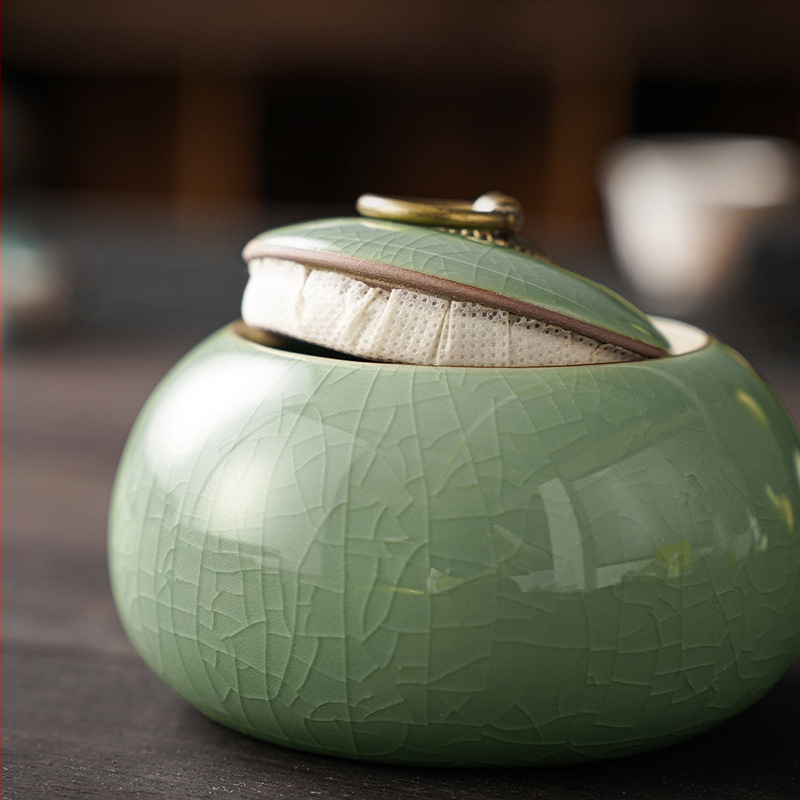 Ge kemence teaüveg lezárt üveg kerámia kis hordozható celadon tea Pu'er tárolóedény háztartási nagykereskedelem