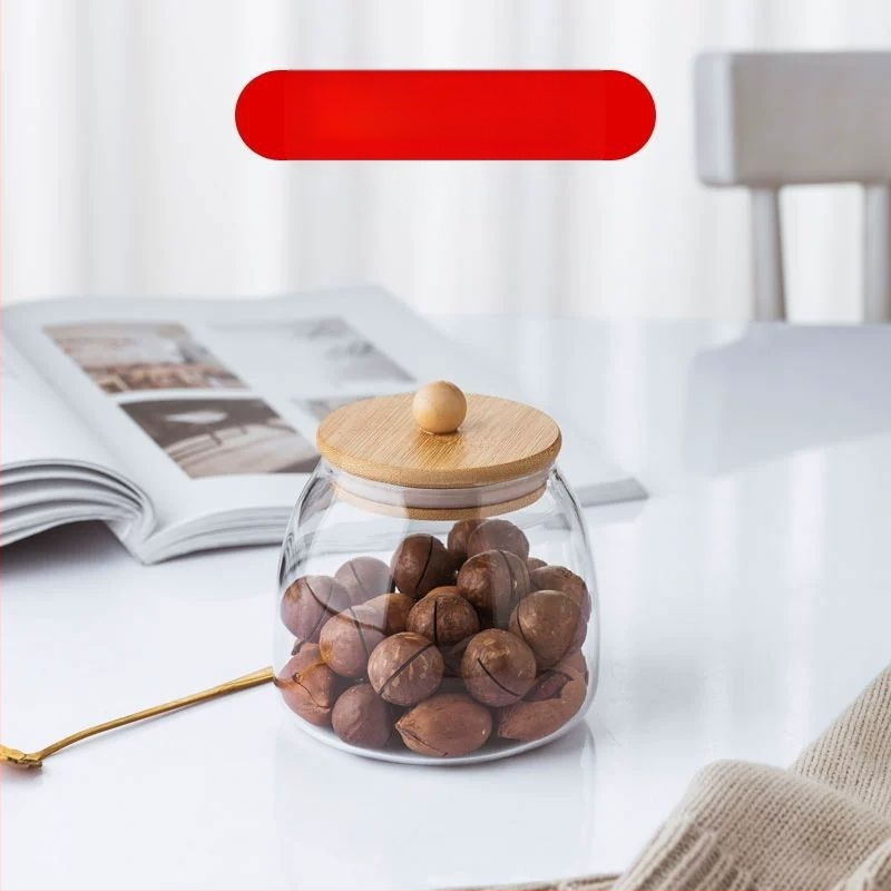 Skaidrus stiklinis arbatos indelis, kvapnus arbatos indelis, juodos arbatos buteliukas, apvalus bambukinis dangtelis su sandarinimo žiedu, prieskonių laikymo indelis