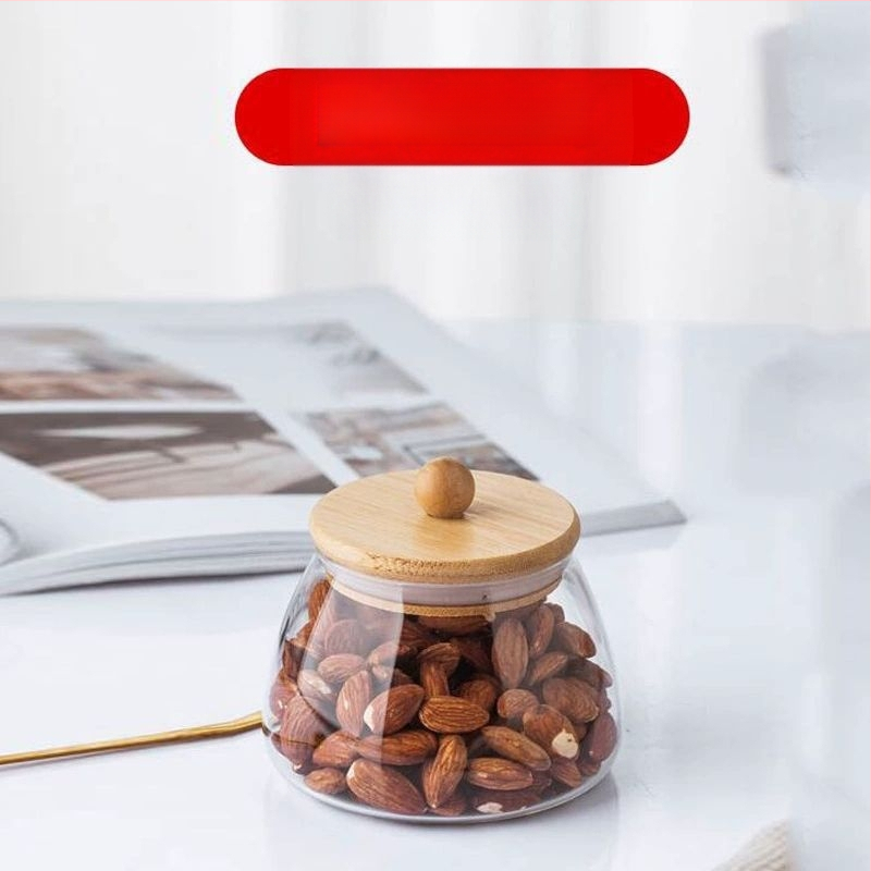 Skaidrus stiklinis arbatos indelis, kvapnus arbatos indelis, juodos arbatos buteliukas, apvalus bambukinis dangtelis su sandarinimo žiedu, prieskonių laikymo indelis