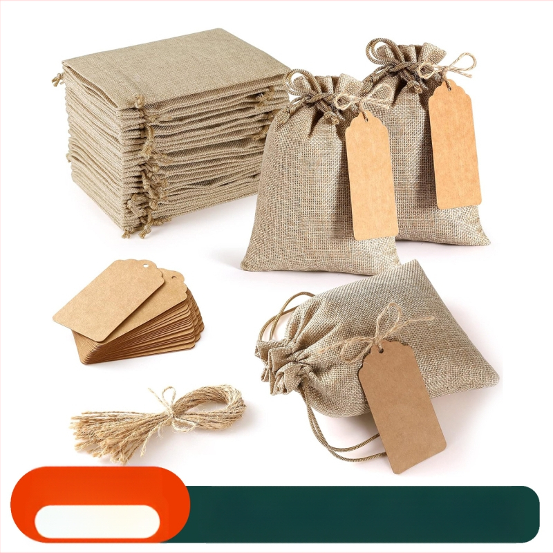 Pulmapeo kinkekott, isetehtud silt, kanepiköiest linasest kimbust taskuga, 25 ülikonnapruuni linasest kotiga, risti äärega