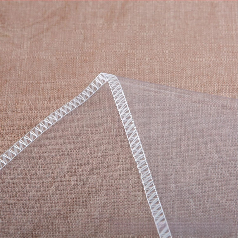 Läbipaistev plastlaudlina 100% veekindel kristallselge läbipaistev lauakaitsekate 0,13 mm lukuga servaga laudlina