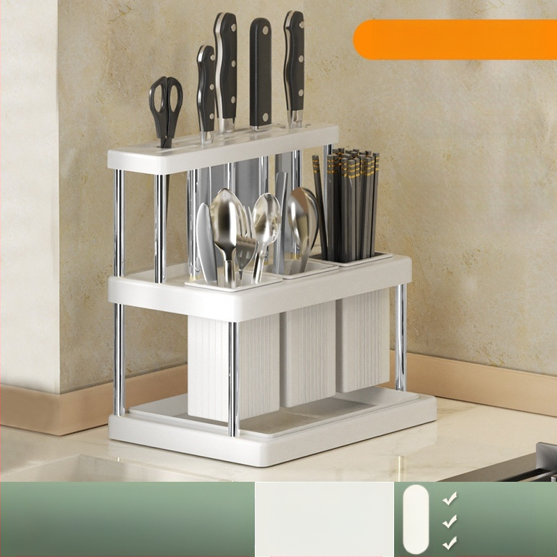 Populaarne noahoidja, söögipulkade toru, multifunktsionaalne köögiriiul, nugade ja kahvlite hoiuriiul