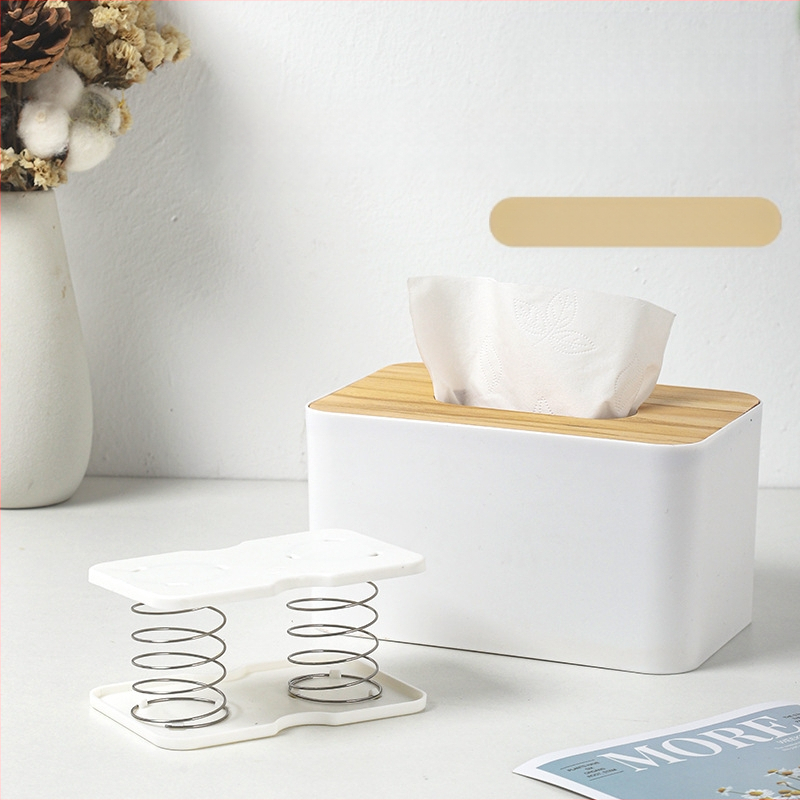 Pakeliama servetėlių dėžutės spyruoklinė atrama, skirta pritraukti prie apatinės spyruoklinės stalčiaus dėžutės apatinės atramos, laikymo dėžutės spyruoklinė lapo pakėlimo elastinė atrama